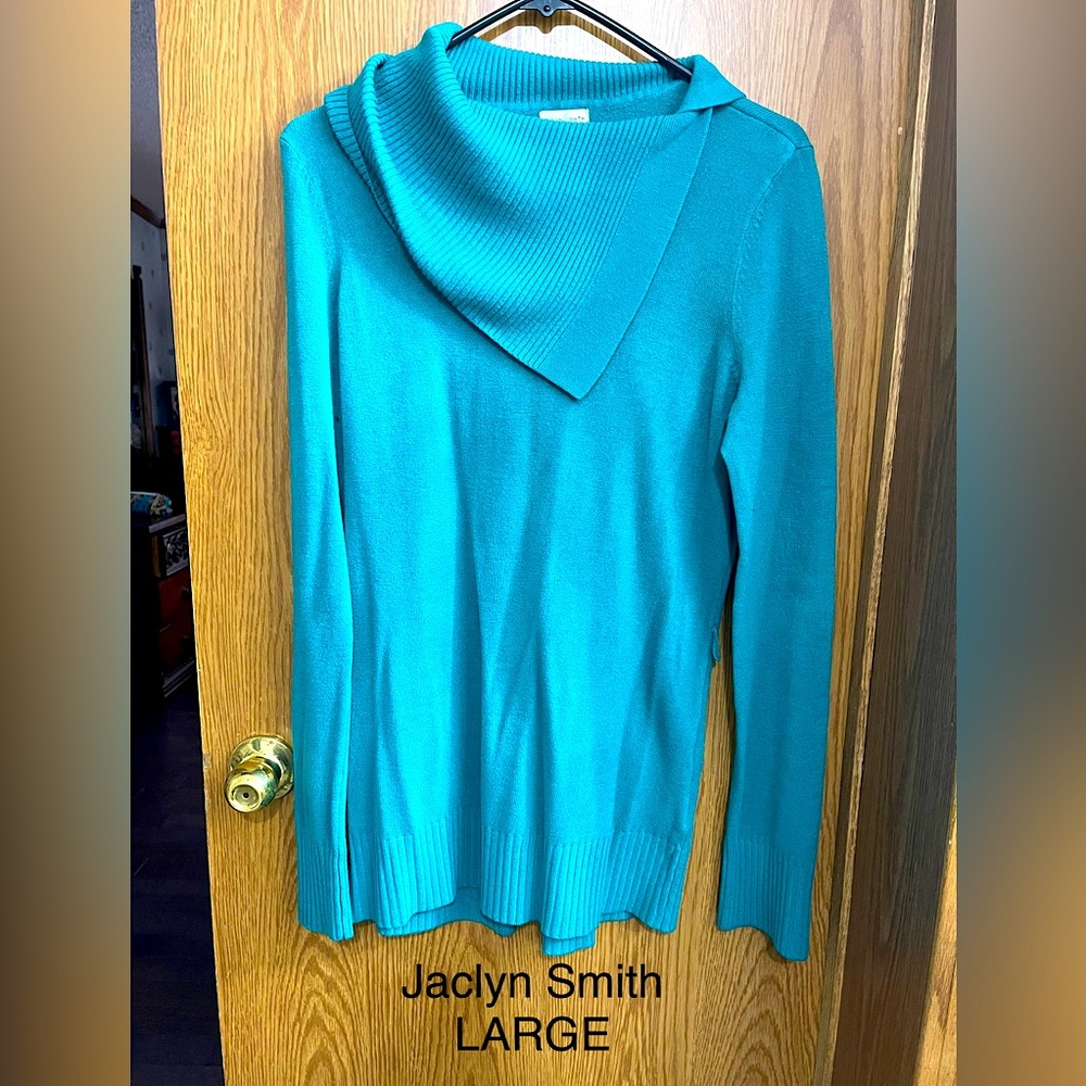 Jaclyn Smith Sweater the color is Teal